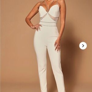 Elegant Cream Jumpsuit with Chain Detailing